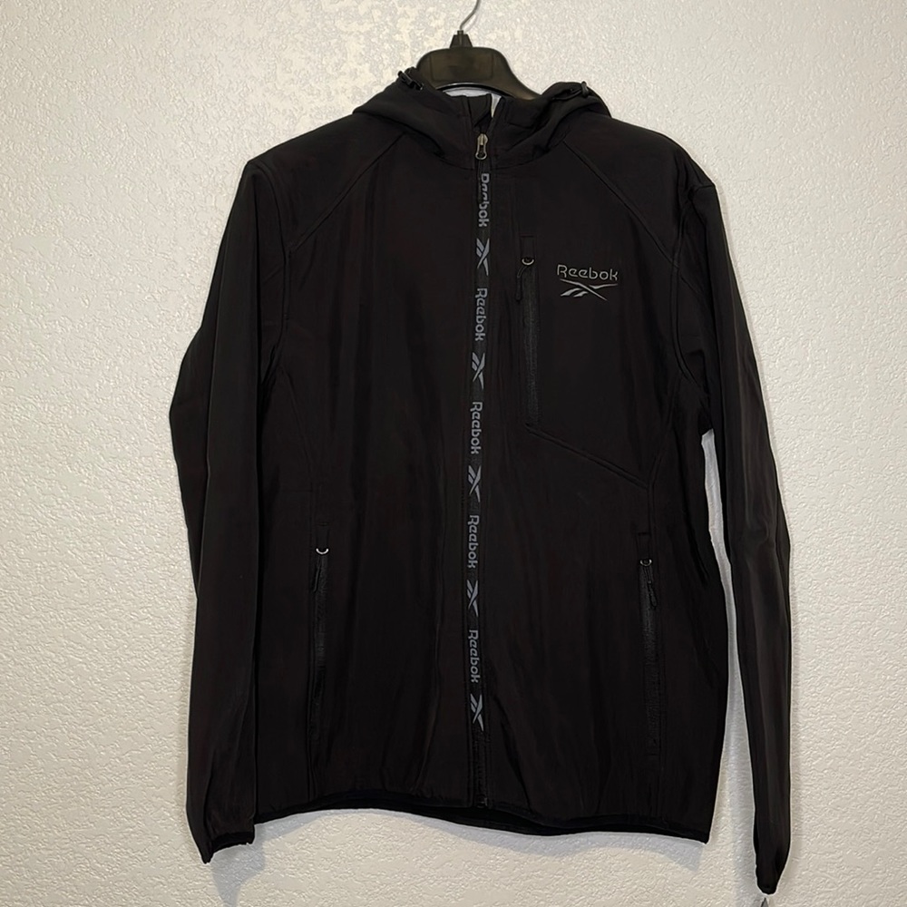 NWT Reebok Black Soft Shell Hooded Windbreaker Jacket Men’s L/XL Water Resistant